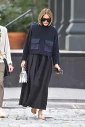 Olivia Palermo Wears a Black Skirt and Blue Sweater in New York City 09/17/2023