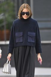 Olivia Palermo Wears a Black Skirt and Blue Sweater in New York City 09/17/2023