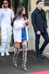 Selena Gomez in a Denim Skirt and Knee-high Snakeskin Boots at Manko in Paris 09/26/2023