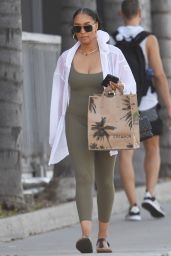 Tia Mowry in a Tight Olive Green Sports Bra and Leggings - Shopping at Erewhon Market in LA 09/26/2023