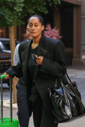 Tracee Ellis Ross in a Black Outfit and Green Luggage in New York 09/19/2023