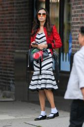 Famke Janssen Wearing Tinted Sunglasses and Red Jacket in New York 10/10/2023