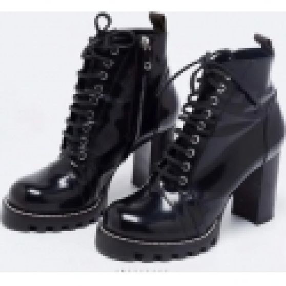 Louis Vuitton Star Trail Ankle Boot Black worn by Taylor Swift in New York  City on October 15, 2023