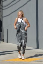Malin Akerman in Gray Overalls Paired With White Sneakers 10/27/2023