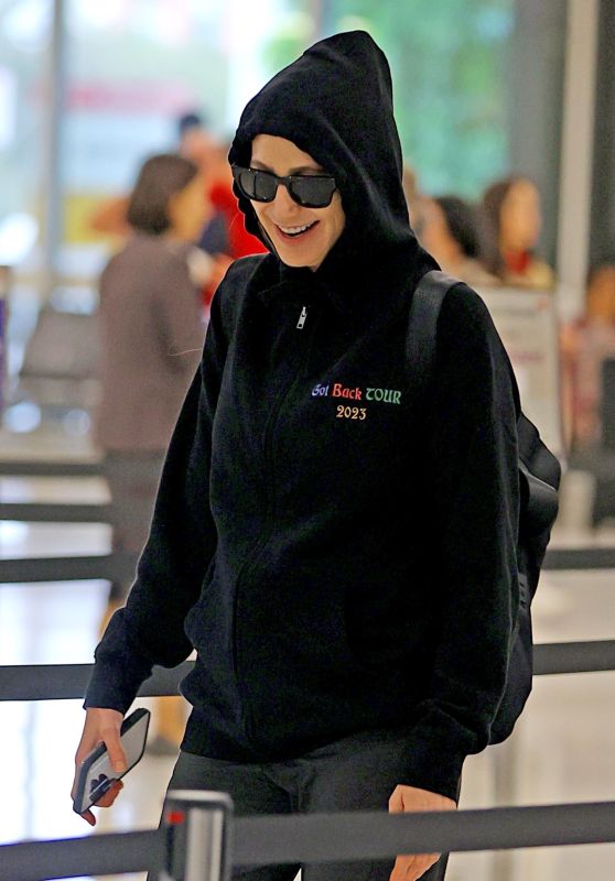 Nancy Shevell Wears a Paul McCartney "Got Back Tour" Hoodie - Sydney Airport 10/28/2023