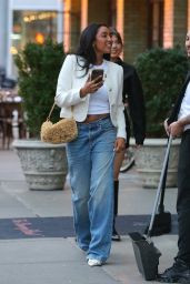 Tayshia Adams With Her FENDI Puffy Bag in New York 10/19/2023