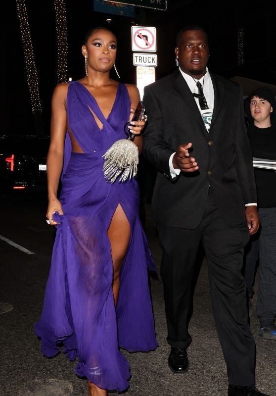 CoCo Jones in a Blue Dress Leaving Beyonce