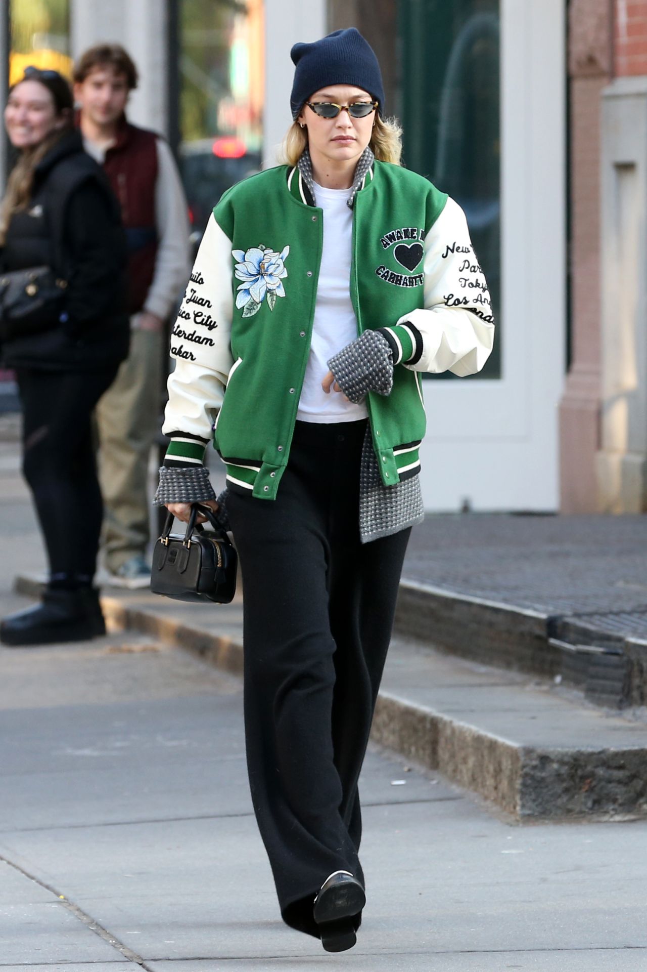 Gigi Hadid in a Varsity Jacket and Miu Miu Bowling Bag in New York 11