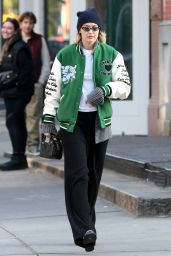 Gigi Hadid in a Varsity Jacket and Miu Miu Bowling Bag in New York 11/05/2023