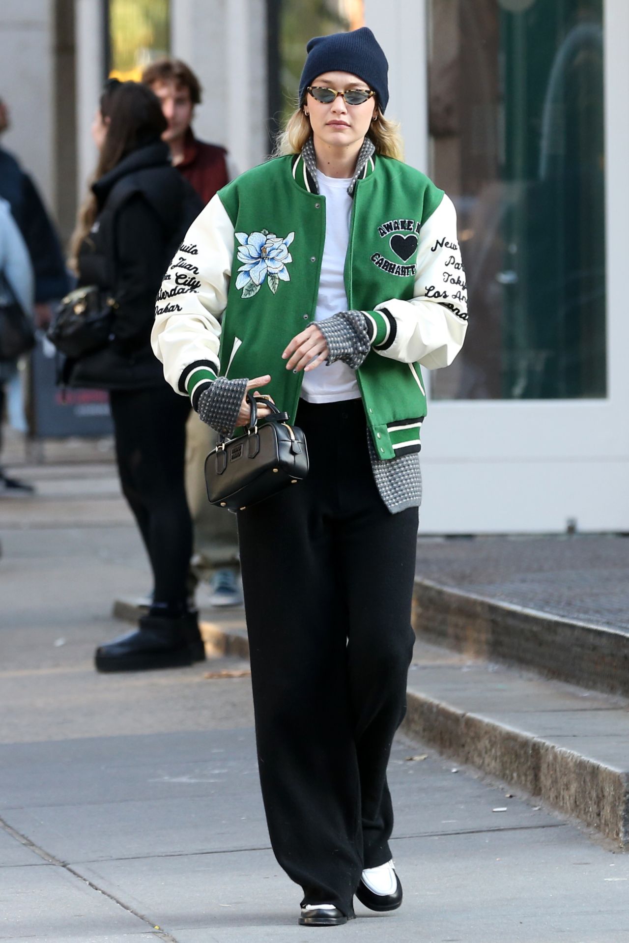 Gigi Hadid in a Varsity Jacket and Miu Miu Bowling Bag in New York 11