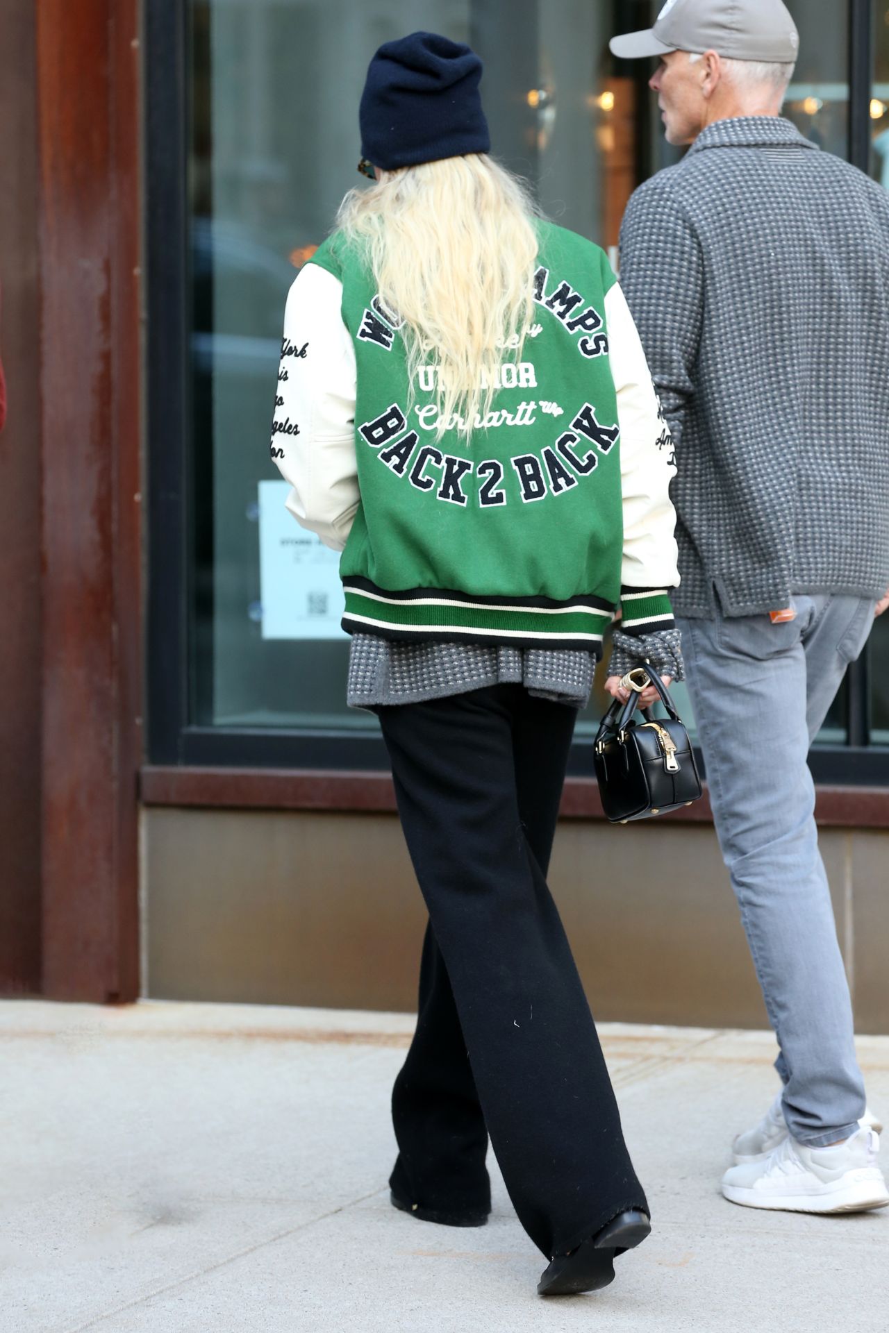 Gigi Hadid in a Varsity Jacket and Miu Miu Bowling Bag in New York 11