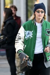 Gigi Hadid in a Varsity Jacket and Miu Miu Bowling Bag in New York 11/05/2023