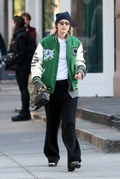 Gigi Hadid in a Varsity Jacket and Miu Miu Bowling Bag in New York 11/05/2023