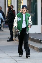 Gigi Hadid in a Varsity Jacket and Miu Miu Bowling Bag in New York 11/05/2023