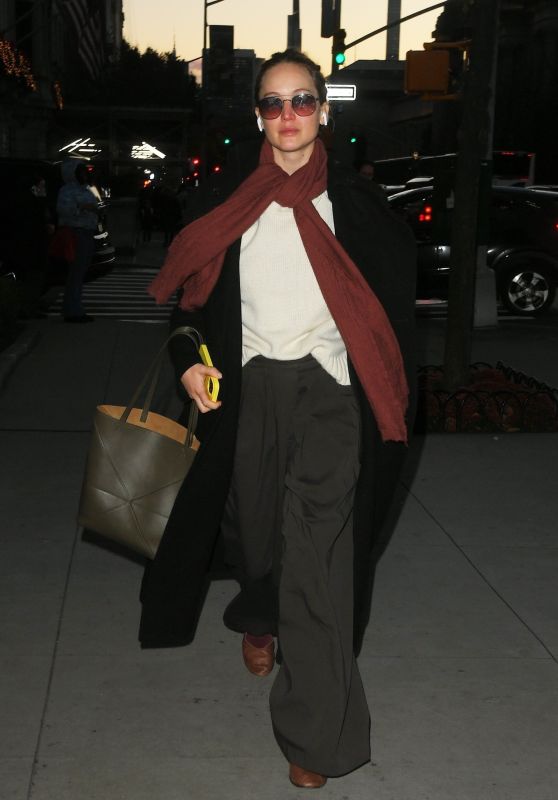 Jennifer Lawrence in a Long Overcoat and Scarf - New York 11/28/2023