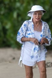Joan Collins and Percy Gibson at the Beach on Their Holidays in Western Barbados 10/29/2023