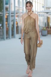 Josephine Skriver in Gold Pantsuit at the Cult Gaia Fashion Show in Los Angeles 11/14/2023