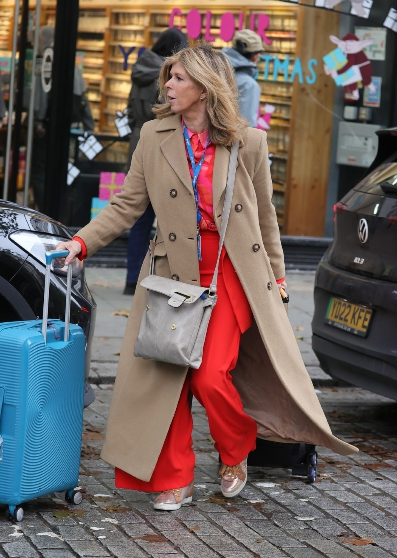 Kate Garraway Wearing Bright Red Flared Trousers and Bright Top ...