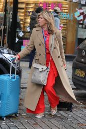 Kate Garraway Wearing Bright Red Flared Trousers and Bright Top - London 11/02/2023
