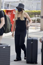 Margot Robbie and Tom Ackerley at the Airport in Brisbane 11/05/2023