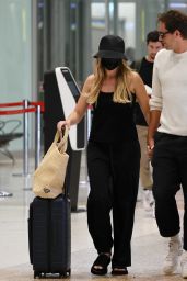 Margot Robbie and Tom Ackerley at the Airport in Brisbane 11/05/2023