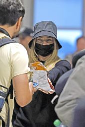 Margot Robbie at the Airport in Melbourne 11/07/2023
