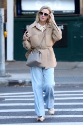 Naomi Watts in a Cream Fendi Jacket, Fendi Peekaboo Handbag, Jeans and Sneakers in NYC 11/19/2023