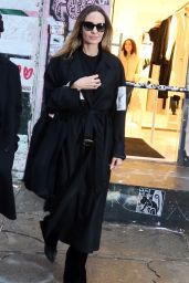 Angelina Jolie in Chic Navy Dress at Atelier Jolie in NYC 12/28/2023
