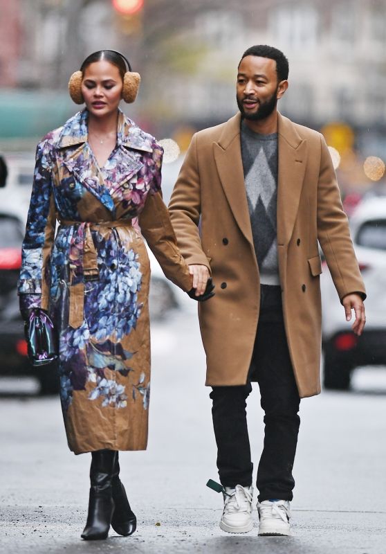 Chrissy Teigen and John Legend at the Top of the Rock at Rockefeller Center in New York 12/27/2023