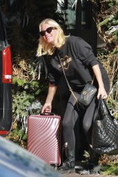 Denise Van Outen in Travel Outfit With Her Luggage Leaves Marbella 12/23/2023