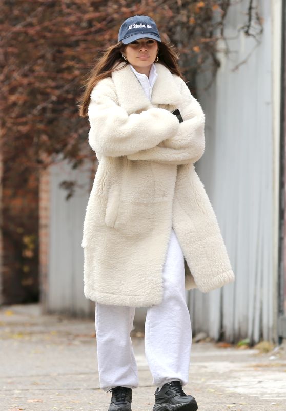 Emily Ratajkowski in a White Fluffy Coat and White Sweatpants in New York 12/11/2023