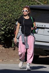 Eva Mendes in Pink PANGAIA Sweatpants, Black Top and Green Bag in Santa Barbara 12/04/2023
