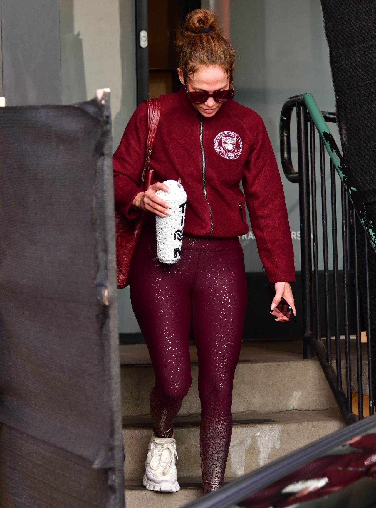 Jennifer Lopez in Maroon Jacket Paired With a Matching Bag, Ombré