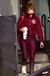Jennifer Lopez in Maroon Jacket Paired With a Matching Bag, Ombré Sparkly Leggings and White Prada Sneakers in Studio City 12/05/2023