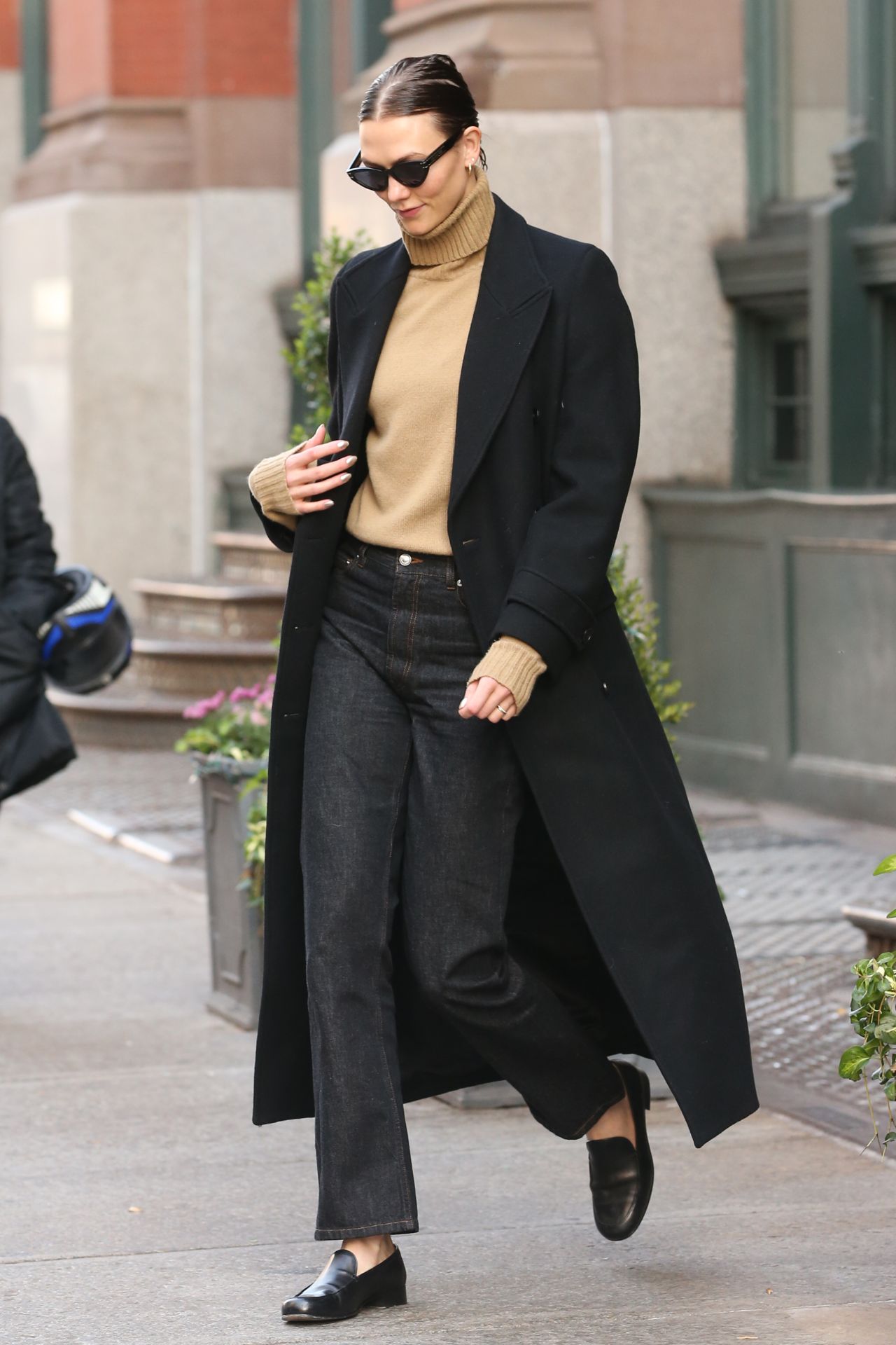 Karlie Kloss in a Tan Turtleneck, Black Jeans and Black Overcoat in NYC ...