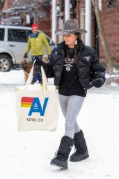 Kyle Richards in a Black Prada Jacket Paired With Matching Prada Sweater and Boots in Aspen 12/24/2023