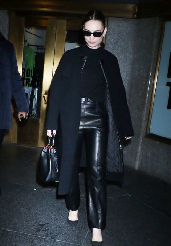 Lily James in Black Leather and a Long Black Overcoat at The Kelly Clarkson Show in New York 12/18/2023