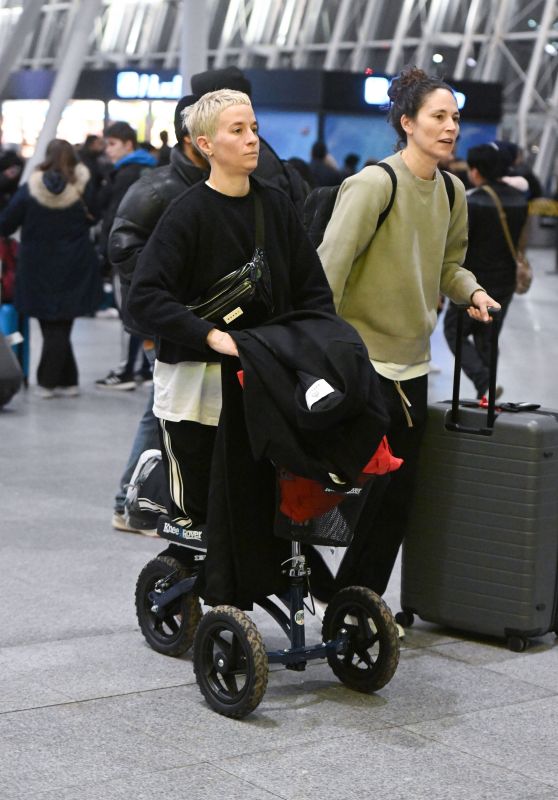 Megan Rapinoe With Partner Sue Bird at JFK Airport in NY 12/13/2023