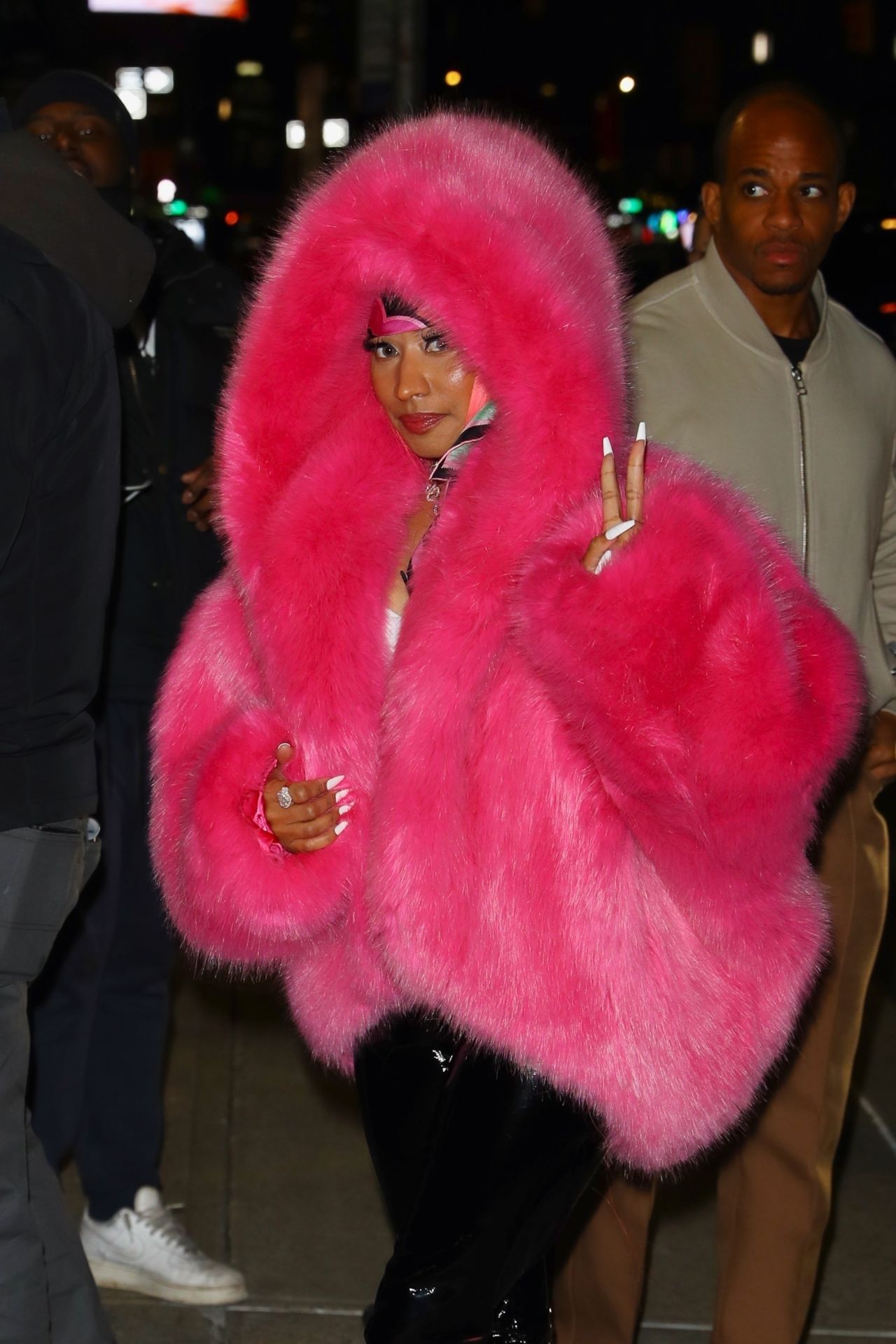 Nicki Minaj's Neon Fur Coats Are Delicious Campy Fun