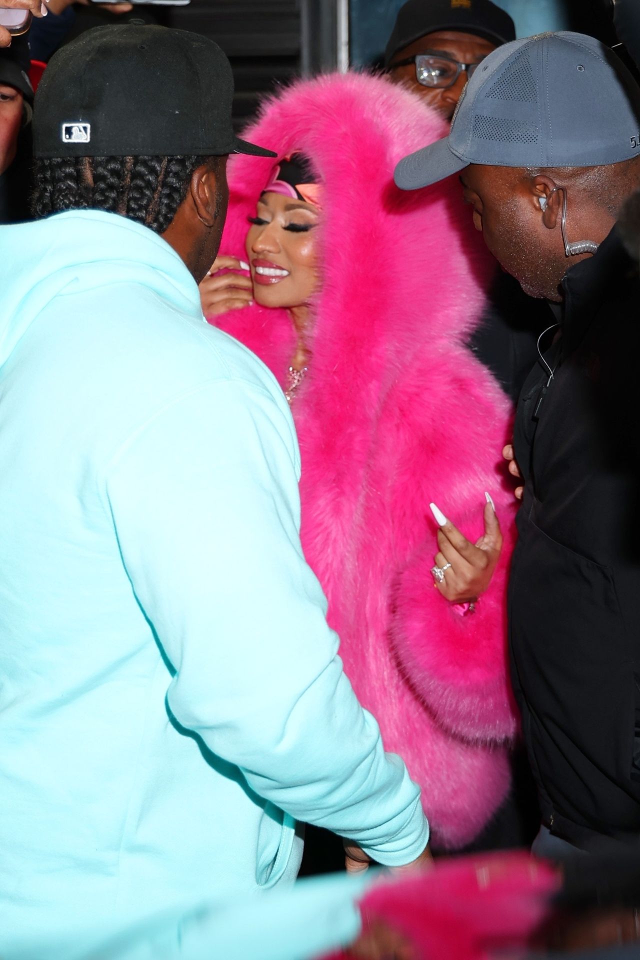 Nicki Minaj in Bright Pink Fur Coat, Black Latex Leggings and Matching ...