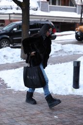 Noor Alfallah in a Fur Jacket, Jeans and Prada Boots - Shopping in Aspen 12/28/2023