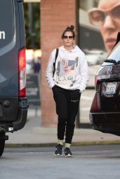 Teri Hatcher in Black Sweatpants and a White Hoodie Shopping in Los Angeles 12/28/2023