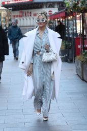 Ashley Roberts Wears White Retro Sun Glasses and Light Blue Pinstripe Suit in London 01/18/2024