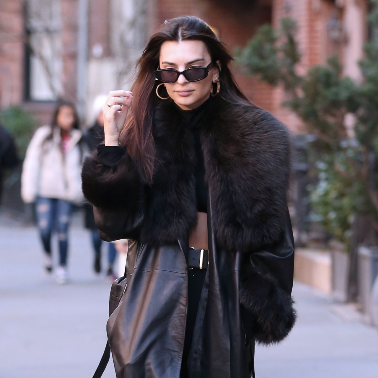 Emily Ratajkowski in a Crop Top, Pants and Leather Coat in New York ...