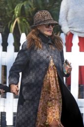 Eva Mendes in Her Grey Chanel Coast and Leopard-print Fedora in Santa Barbara 01/25/2024