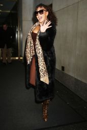 Melanie Brown in a Brown Bodysuit, Leopard Print Boots, Leopard Print Scarf and Black Fur Coat in New York 01/08/2024