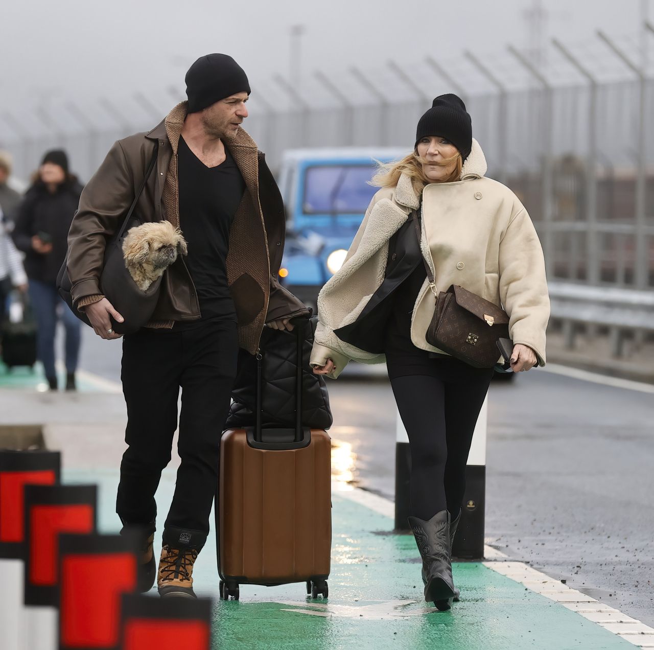 Michelle Collins at Malaga Airport in Luton 01/02/2024 • CelebMafia