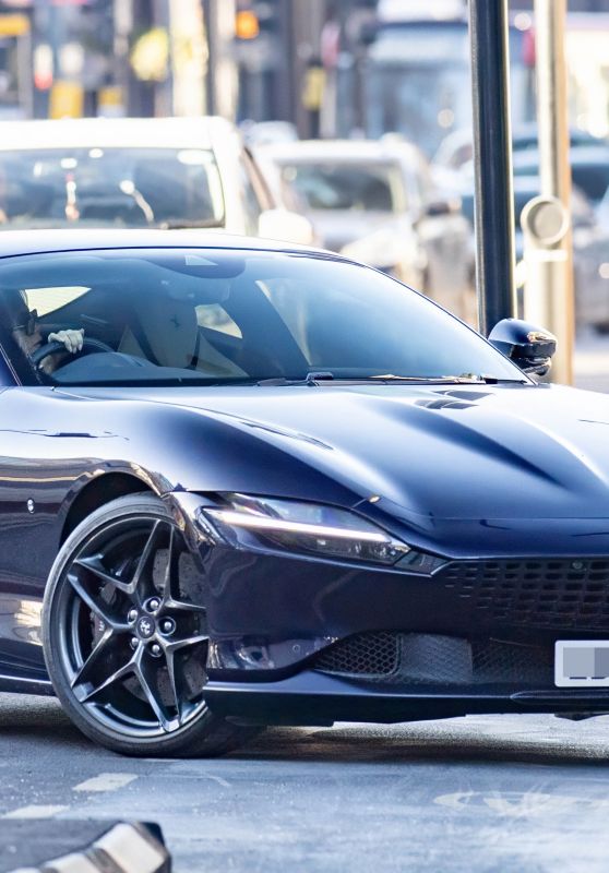 Victoria Beckham in a Ferrari Roma Blu Pozzi in London 01/16/2024