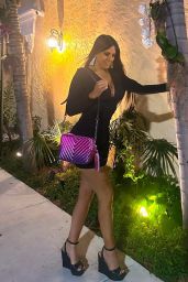 Claudia Romani in a Low-cut Black Dress at Casadonna in Miami 02/22/2024