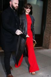 Dakota Johnson in a Red Jumpsuit and Sandals in New York 02/07/2024